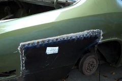 Got the patch panel welded in but now have to recreate that whole body line due to all that unnecessary body filler someone laid in it