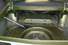 Cut in the paint around the trunk lid area and shot the spare tire area