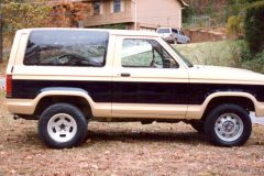 Bronco repaint with custom stripe down the sides. Pin stripping was added later