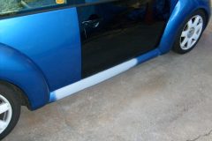 1999 Beatle with replaced door and rocker panel repair where it was crushed