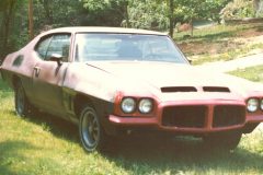 The car was silver originally and had a few replacement parts on front